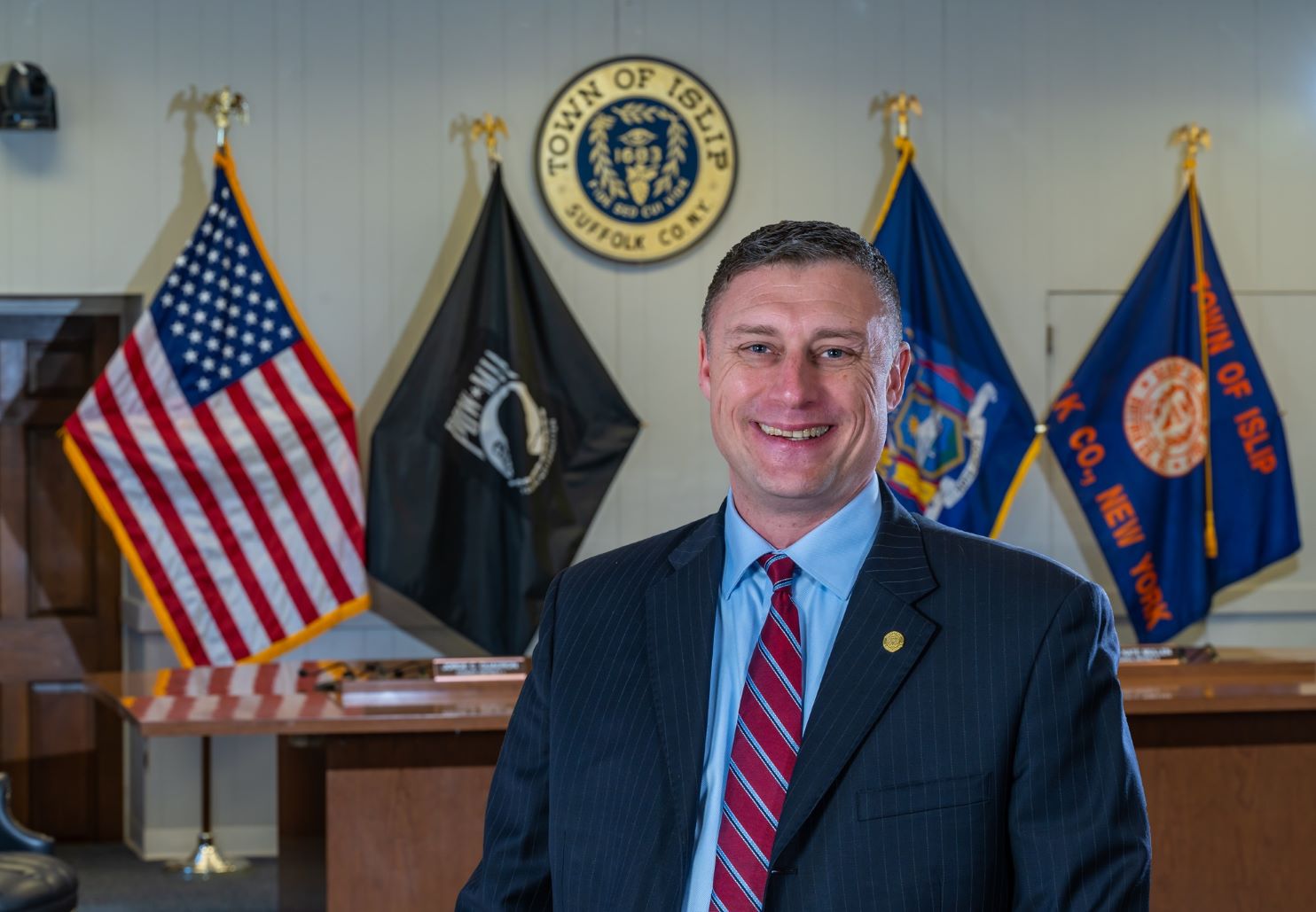 Receiver of Taxes Andy Wittman in front of Town Board room