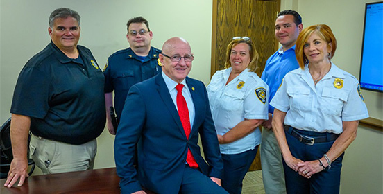 Joe Fox poses with Public Safety Officers at the most recent leadership training course he conducted