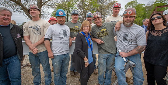 Supervisor Carpenter joins with construction crews helping to build the museum