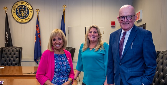 Supervisor Angie Carpenter stands with James Bowers and Julia McGibbon from the Town of Islip Community Development Agency joined to discuss the emergency rental program offered to help residents of the Town.