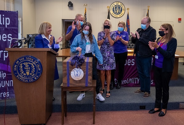 supervisor carpenter, members of the Islip Town Board and community advocates gather to switch the Town Cupola Purple and launch the Third annual Islip Goes Purple through the month of September 