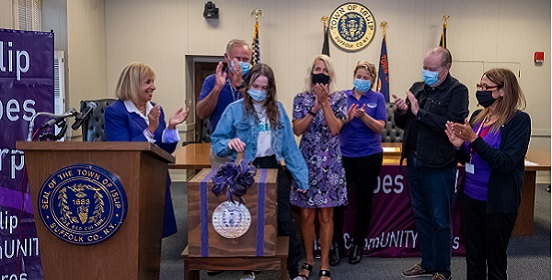 supervisor carpenter, members of the Islip Town Board and community advocates gather to switch the Town Cupola Purple and launch the Third annual Islip Goes Purple through the month of September 