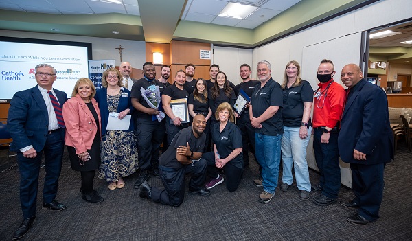 Supervisor Carpenter and officials stand with the graduates of the EMS Class for Hunter