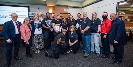 Supervisor Carpenter and officials stand with the graduates of the EMS Class for Hunter