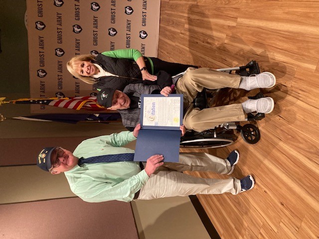 Supervisor Carpenter and Councilman Cochrane stand with Army Veteran Nick Leo, presenting him a citation of recognition for his dedicated service during WWII