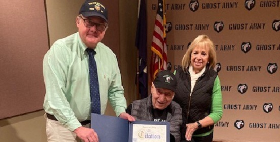 Supervisor Carpenter and Councilman Cochrane stand with Army Veteran Nick Leo, presenting him a citation of recognition for his dedicated service during WWII