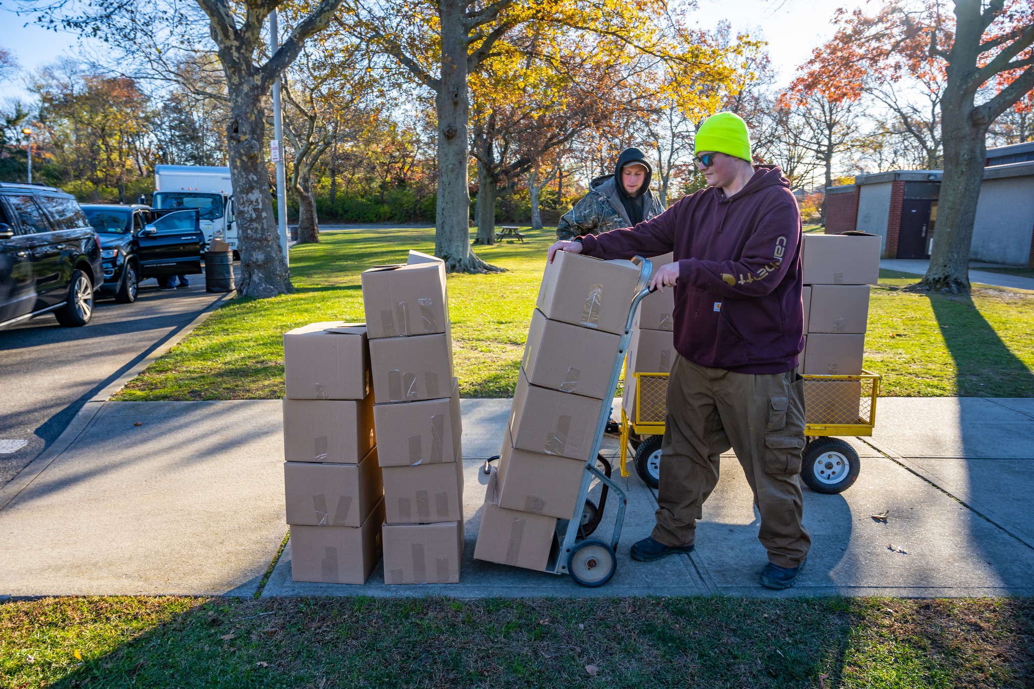 boxes being loaded onto handtruck