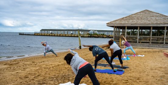  instructor shows attendees pose