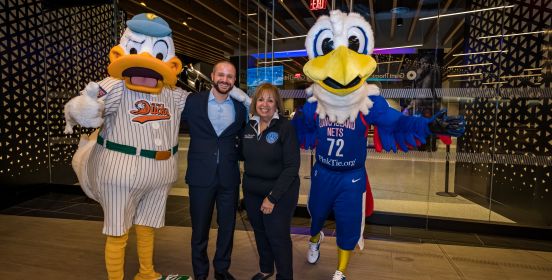Islip Supervisor Carpenter poses for a photo with Nets representative and mascot as well as Ducks Mascot QuackerJack.