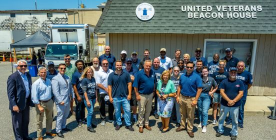 group photo of vets with Supervisor Carpenter and Councilman Cochrane