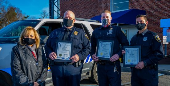 Supervisor takes group photo with hero rangers