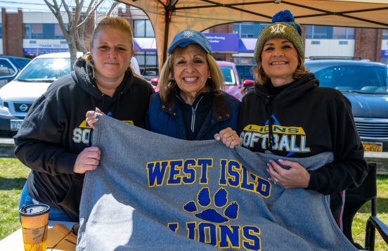 Supervisor with West Islip Lions Blanket and residents