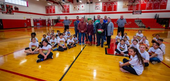 Group photo with supervisor in gym with sharpshooters