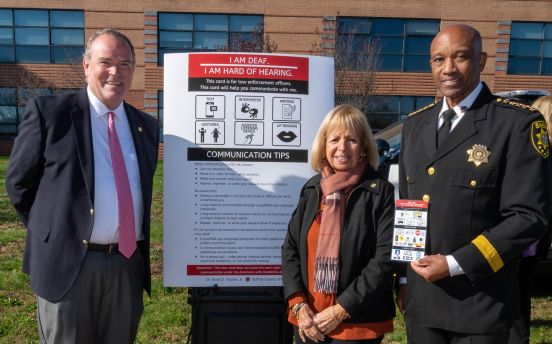 Supervisor Carpenter, Councilman O'Connor, and Sheriff with Palm Card