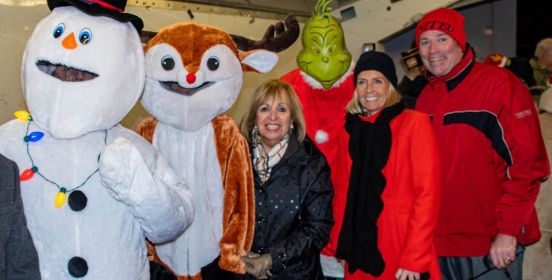  Islip Supervisor Angie Carpenter along with Town Council members Mary Kate Mullen and John P. O'Connor pose with Frosty the Snowman, The Grinch and a Reindeer at the 2019 Islip Holiday Parade and Tree Lighting.