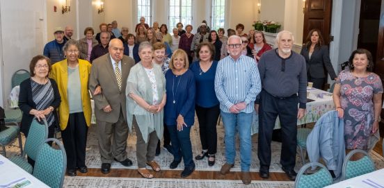 Supervisor and volunteers in group shot with Parks & Rec Officials