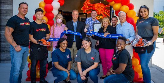 ribbon cutting group photo