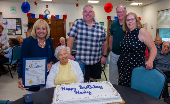 Supervisor in Group Photo in photo with Birthday Girl