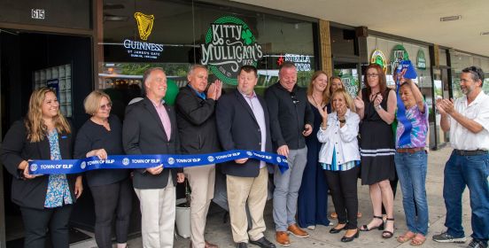 ribbon cutting group photo