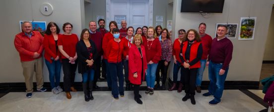 TOI staff wearing red