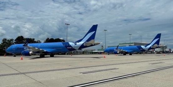 Two Breeze Planes on tarmac.