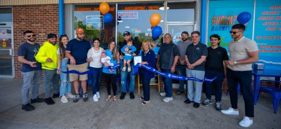 group ribbon cutting shot