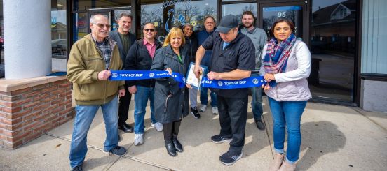 ribbon cutting outside Buttermilk's