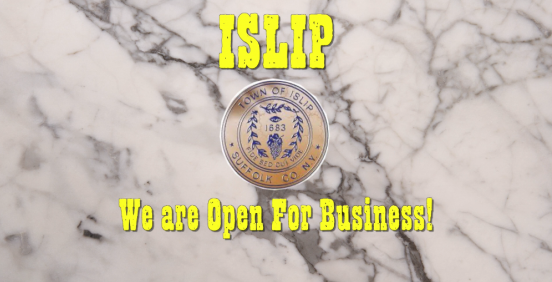marble background with the words that Islip is open for business
