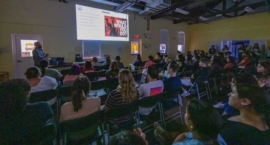 students watching presentation