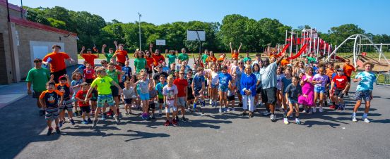 Large group of kids gather for photo