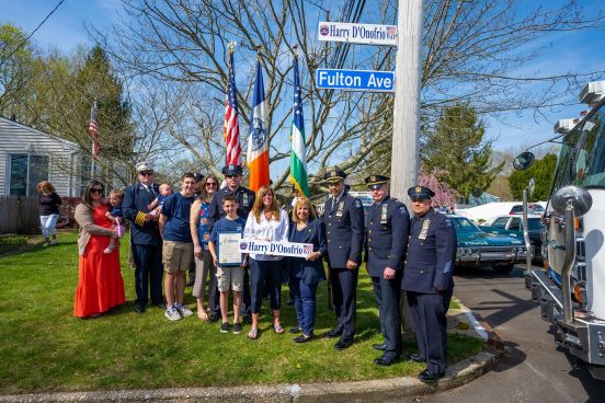 group photo with sign