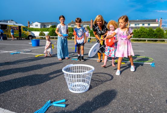 Supervisor Cheers on young girls playing game