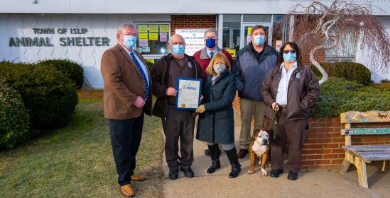 Supervisor Carpenter and Town Officials pose for photo with Tony 