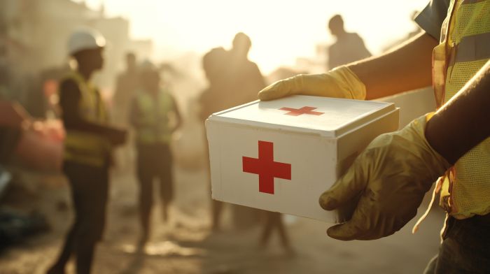 donate-disaster donante to disaster relief image of hands holding med box