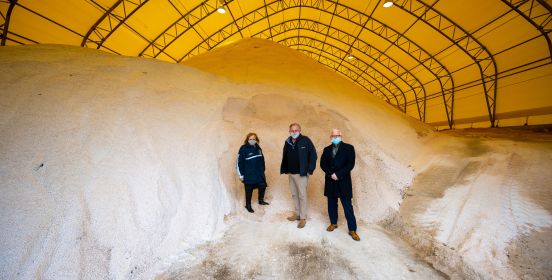 Supervisor Carpenter, Councilman Cochrane, DPW Commissioner Owens in front of mounds of brine