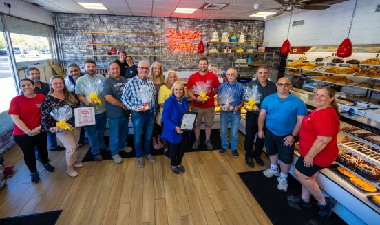 Group photo inside of Stanley's Bakery