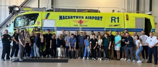 group photo inside fire and rescue building