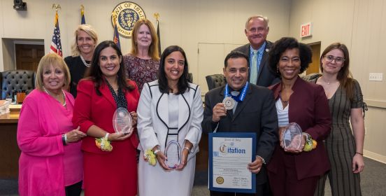 Town Supervisor and the Islip Town Board stand with the Hispanic Heritage Honorees