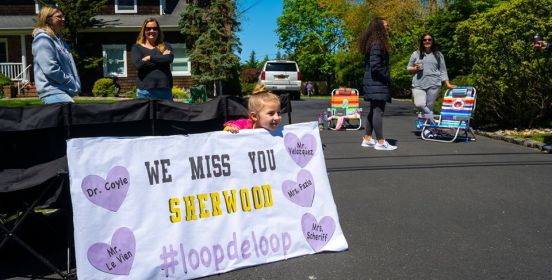 Elementary students view cavalcade of cheer.